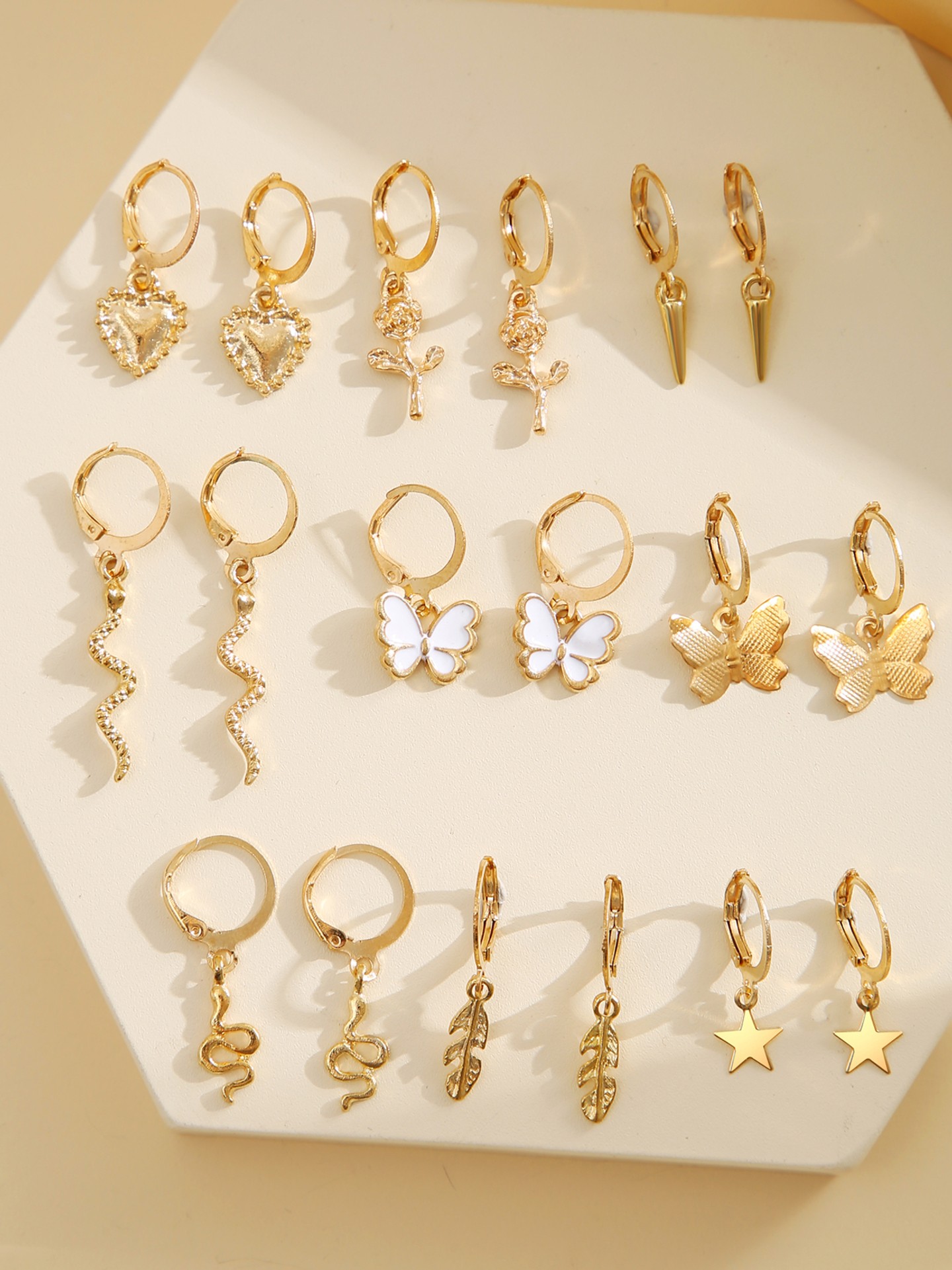 Heart Artificial Jewellery - Earring Set Color: Gold | Size: One-Size | Elements: Heart, Star, Butterfly | Main Material: Alloy | Quantity: 9 Pairs