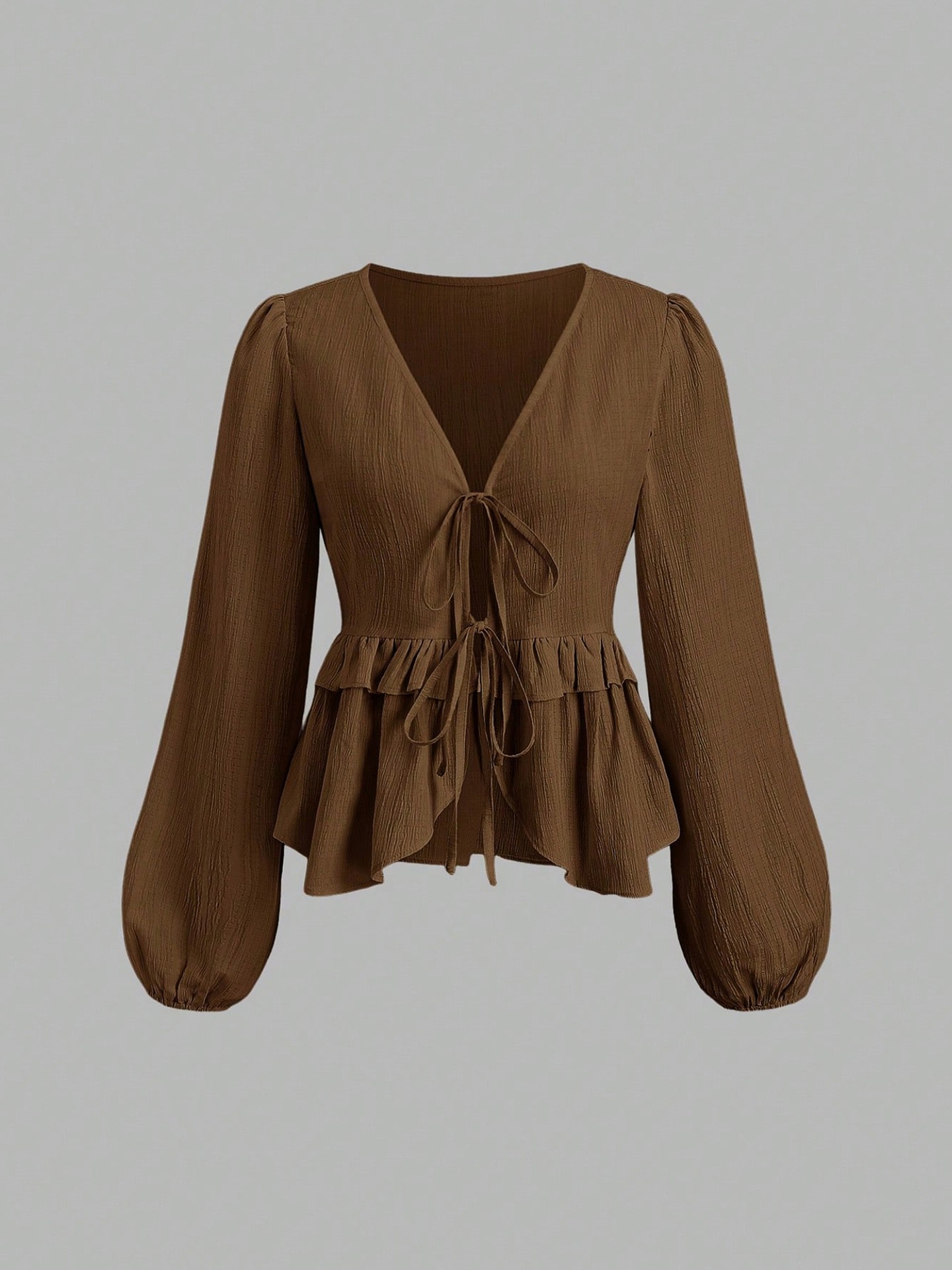 Ruffle Placket Blouse Color: Brown, Apricot | Size: S, M, L, XL | Design Detail: Ruffle, Tie Up | Fabric weight: Medium | Top Length: Regular | Occasion: Date | Main Fabric: Textured | Stretchability: Not Stretchable | Fit Type: Regular Fit | Belt: Does not come with Belt | Sleeve Length: Long Sleeve